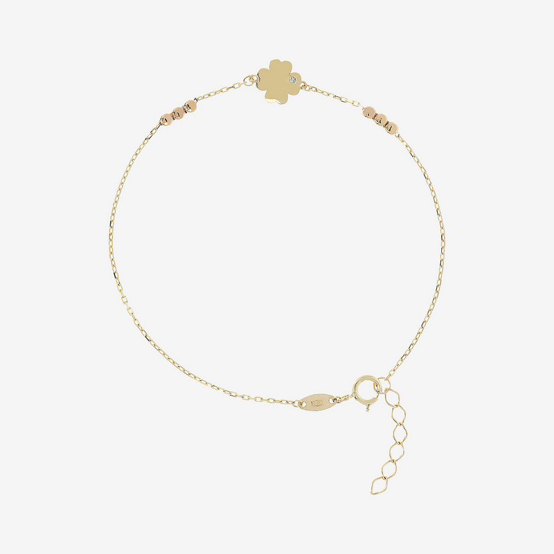 Bracelet chaîne forçat avec trèfle à quatre feuilles en or 9 carats